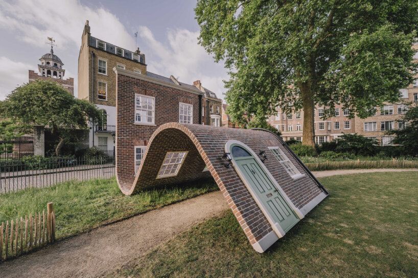alex chinneck monumental brick facade sculpture