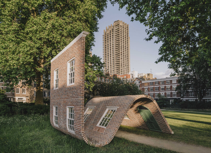 alex chinneck monumental brick facade sculpture